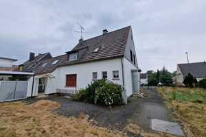 Geräumiges Einfamilienhaus mit Traumgarten in Holzbüttgen... – Bruchweg 84, 41564 Neuss (Rhein-Kreis) – Vorschaubild 1