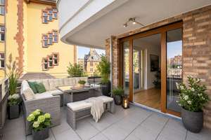 Elegante Drei-Zimmer-Wohnung mit großer Terrasse und Stellplatz