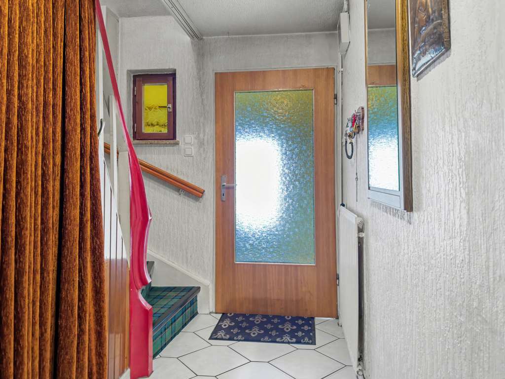 Immobilie in Eutin - Modernisierungschance: Doppelhaushälfte mit umlaufendem Garten - Bild 4