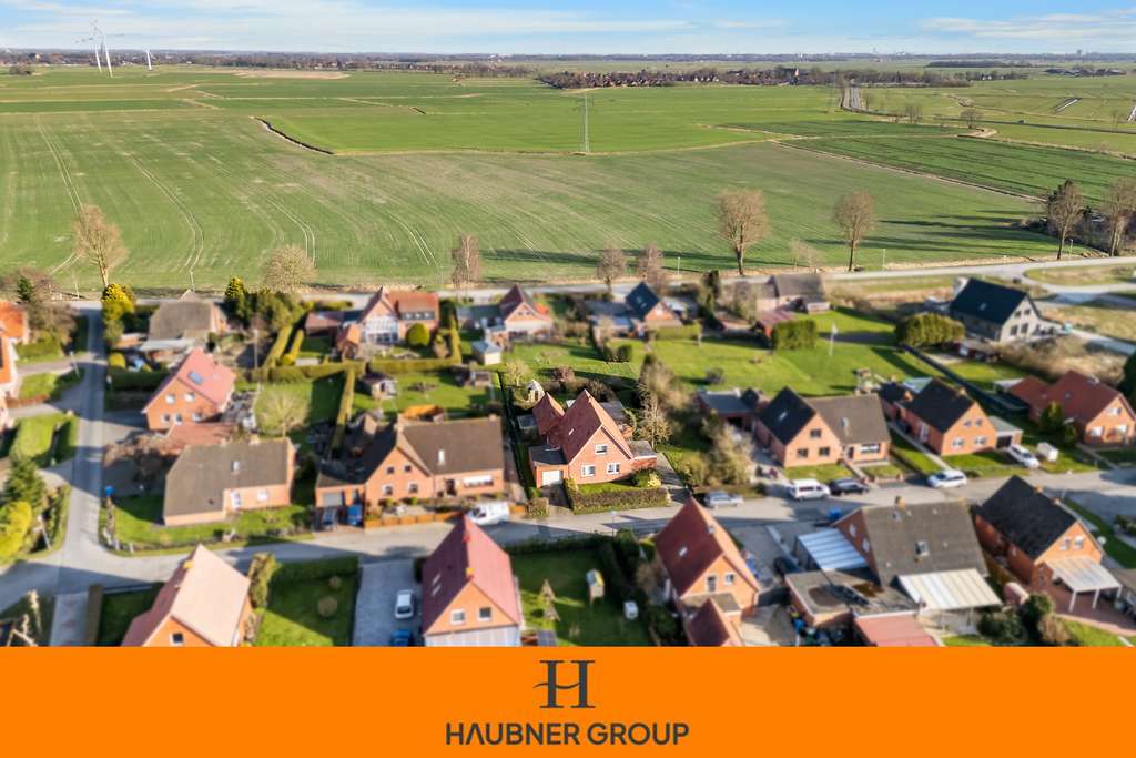 Immobilie in Krummhörn - Seltene Gelegenheit: Großzügiges Grundstück mit Teilungsoption & Bestandsimmobilie - Bild 0