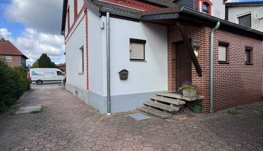 Bild von Doppelhaushälfte mit Bauland im Ortskern von Ehmen