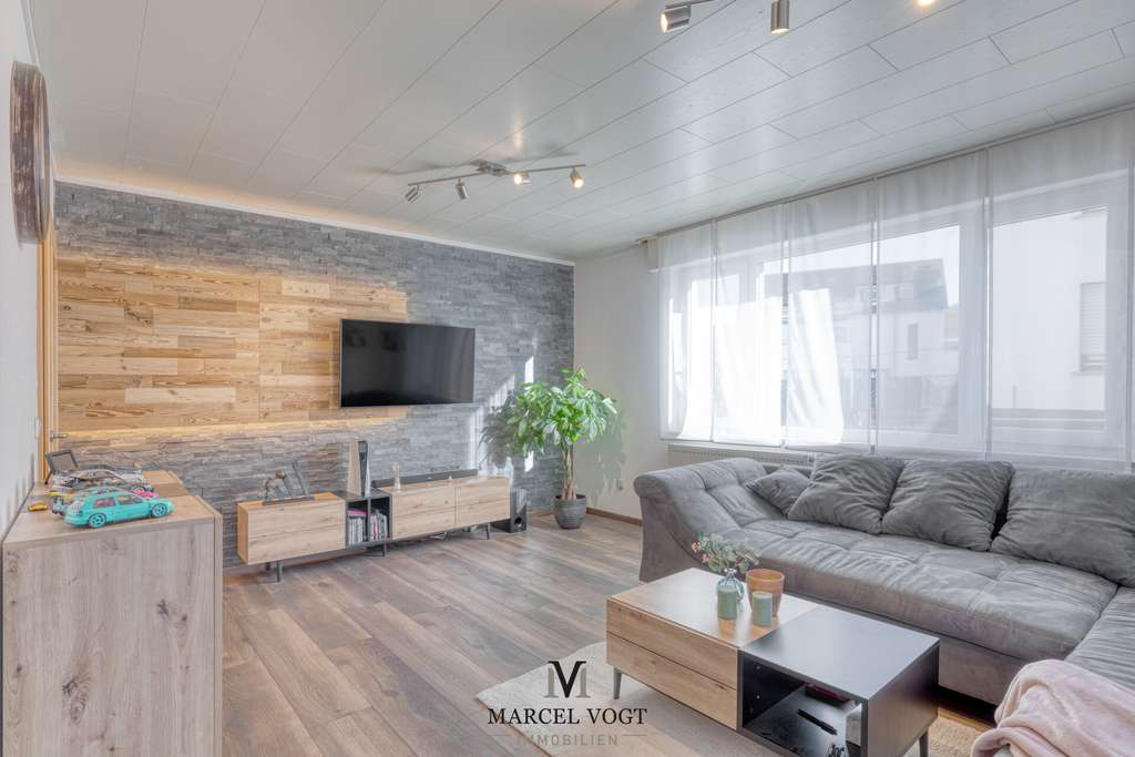 Immobilie in Frickenhausen - Familienfreundliche 4,5-Zimmer-Wohnung mit zwei Terrassen - Bild 0