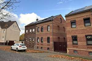 Familienfreundliche Doppelhaushälfte in Raguhn: Wohnglück mit Garten, Teich & moderner PV-Anlage – Wittenberger Straße 9, 6779 Raguhn – Vorschaubild 3