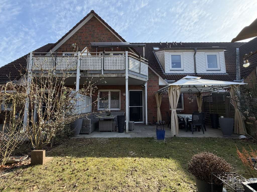 Immobilie in Elmenhorst - Gut vermietete 2- Zimmer Erdgeschosswohnung mit S- W Terrasse, eigenem Gartenanteil und Stellplatz - Bild 0