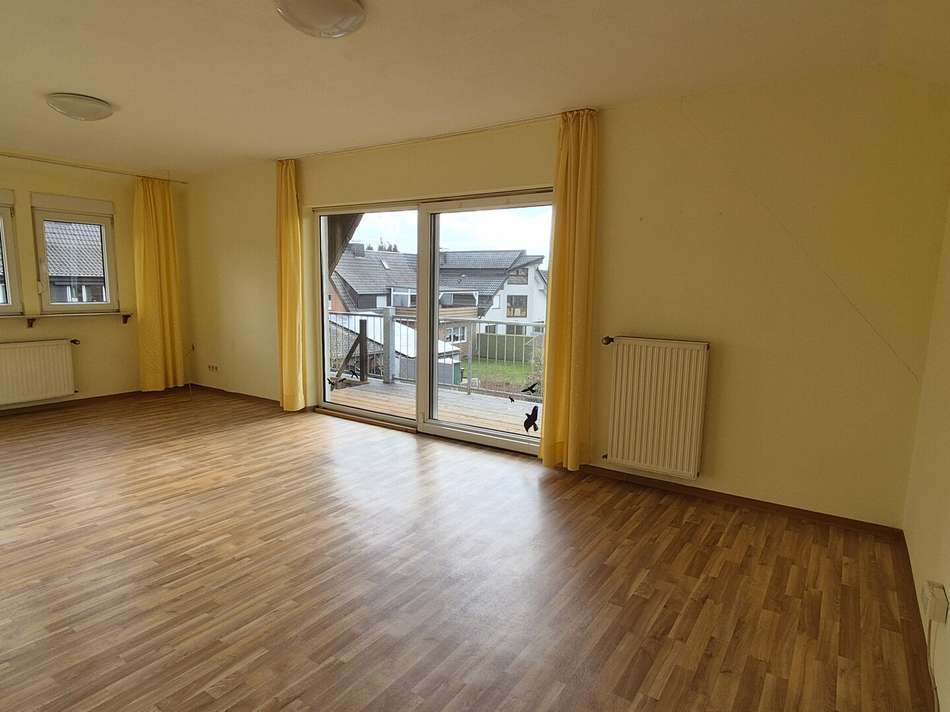 OG Wohnzimmer + Balkon