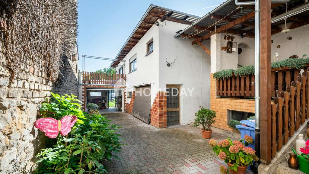 Immobilie in Philippsburg - Zwei Wohneinheiten, ein Zuhause: charmantes Reihenhaus mit Anbau und vielseitigem Platzangebot in P - Bild 2