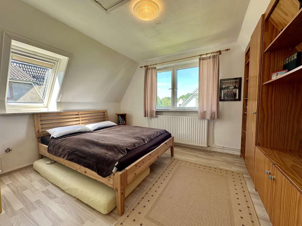 Immobilie in Norderstedt - Charmantes Einfamilienhaus mit Einliegerbereich in ruhiger Lage von Norderstedt - Bild 3