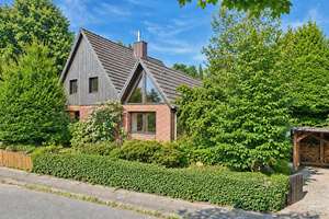 Wohnhaus mit eleganter Erweiterung und schönem Garten im Süden Hamburgs