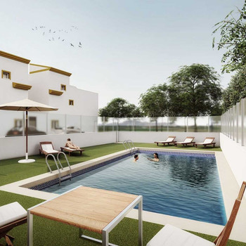 Neubau mit Gemeinschaftspool, Garage und privatem Solarium