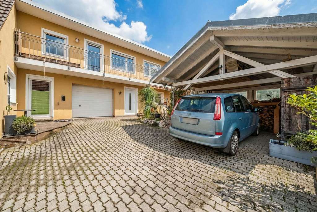 Immobilie in Au in der Hallertau - Einfamilienhaus mit Außenpool und Potenzial - Bild 1