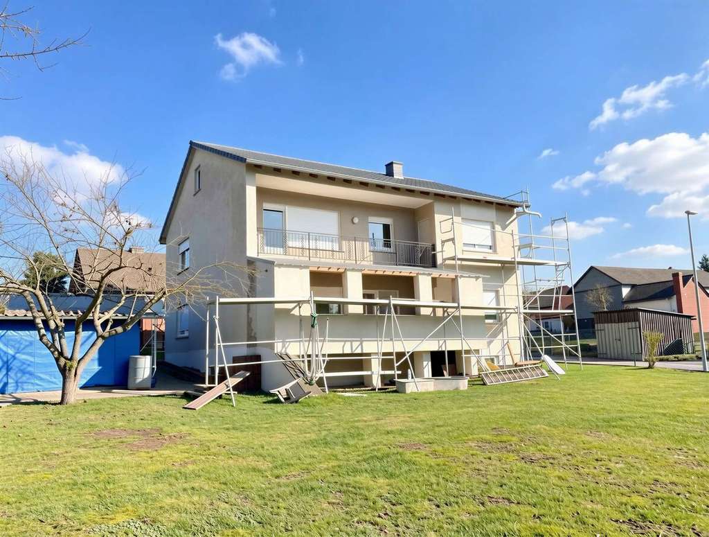 Immobilie in Aßlar - Mehrfamilienhaus mit drei Wohneinheiten und weiterem Baupotenzial - Bild 2