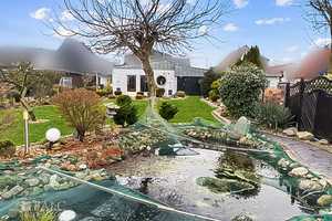 Großzügiges Haus in Delmenhorst mit Gartenidylle, Teich und Carport – Delmenhorst – Vorschaubild 2