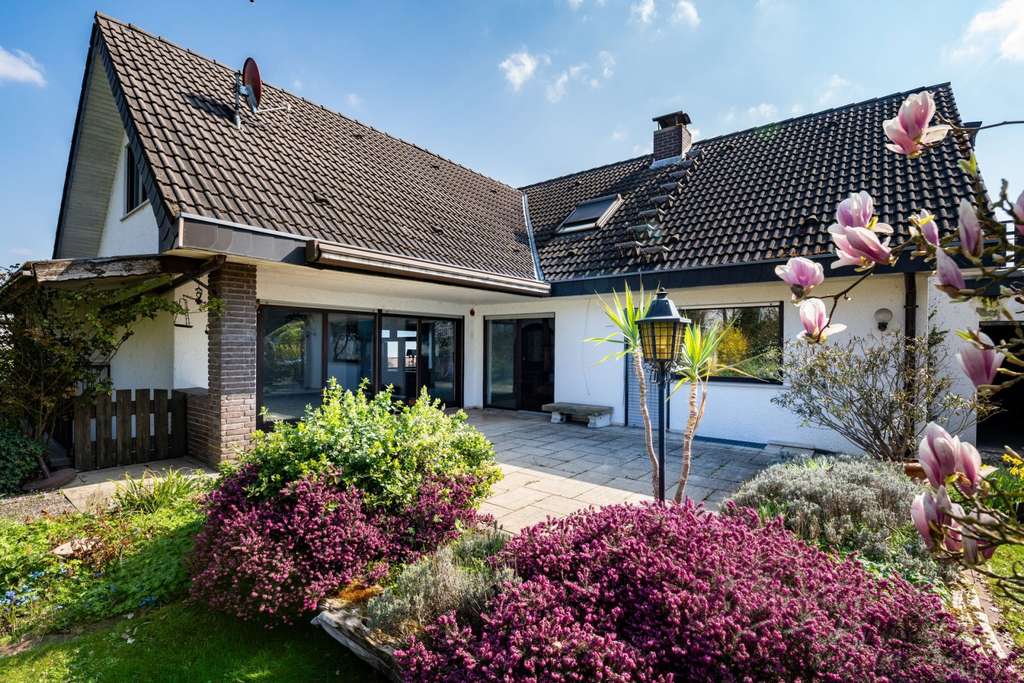 Immobilie in Biblis - Einfamilienhaus in Biblis - Großzügiges Wohnen auf 203 m² mit viel Platz für die ganze Familie - Bild 3