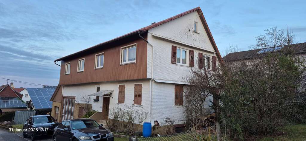 Immobilie in Straubenhardt - Perfekt für Heimwerker - Einfamilienhaus mit großem Anbau - und Garten mit Baufenster - Bild 1