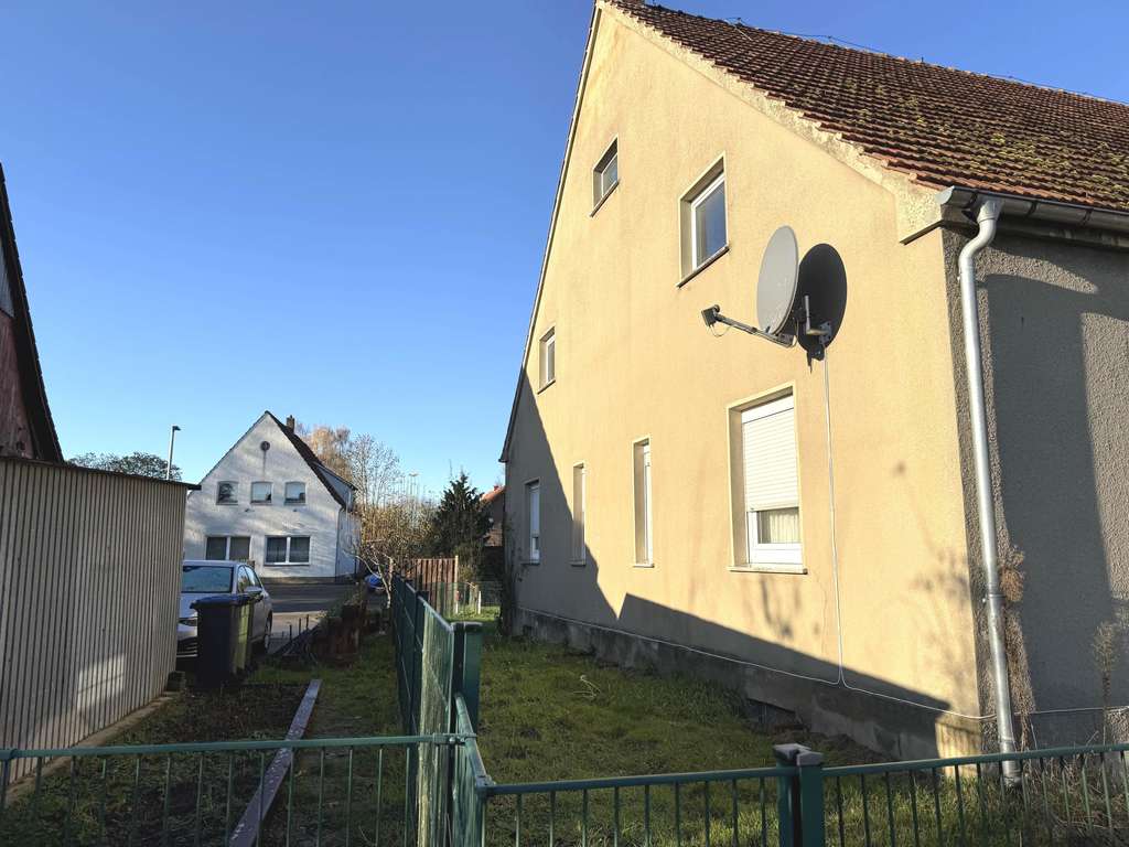 Immobilie in Bünde - Bauernhaus aus 1933 mit Anbau und Potenzial in Bünde-Dünne - Bild 1