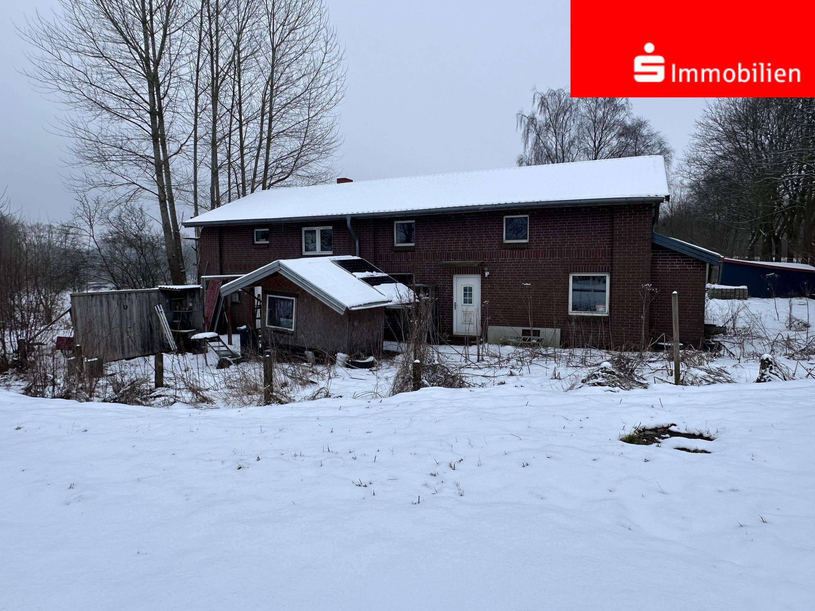 Zweifamilienhaus mit Ausbaureserve auf großem Grundstück, Dithmarschen Kreis – Bild 1