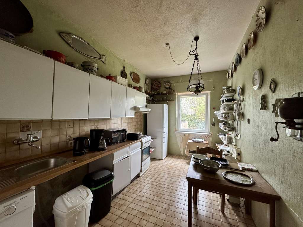 Immobilie in Düsseldorf - Mehrfamilienhaus mit Potenzial in Düsseldorf- Holthausen - Bild 2