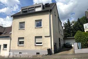Dreiparteienhaus mit Garage und schönem Garten in Bergisch-Gladbach Heidkamp