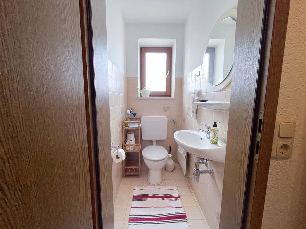 Immobilie in Altötting - Charmante 3-Zimmer-Wohnung mit Balkon und Potential - Bild 4