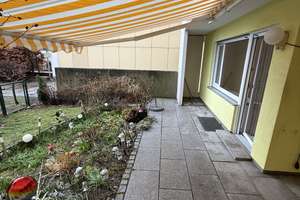 Erdgeschosswohnung mit Garten und Tiefgarage