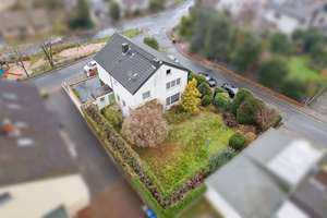 Individuelles Einfamilienhaus mit attraktivem Garten in ruhiger Wohnlage - Niddatal Assenheim – Die vollständige Adresse der Immobilie erhältst du vom Anbieter., 61194 Niddatal – Vorschaubild 1