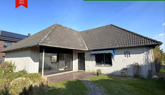 Bild von Großzügiger Winkelbungalow mit viel Platz, lichtdurchfluteten Räumen & Doppelgarage - Nähe Kanal!