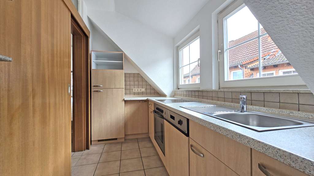 Immobilie in Rockenhausen - Attraktive Dachgeschosswohnung in direkter Innenstadtlage! - Bild 2