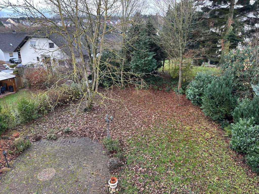 Immobilie in Kirchheimbolanden - Gepflegtes Mehrfamilienhaus mit schönem Garten 4 Stellplätze und Garage - Bild 2