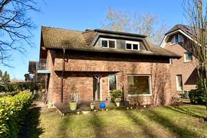 Naturnah wohnen mit Blick in die Rheinaue - Einfamilienhaus mit Garten und Garage