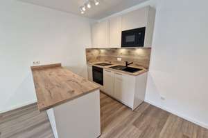 Erstbezug Neubauwohnung mit Balkon in zentraler Lage