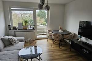 Sanierte 3,5-Zi. Wohnung mit Kamin, Garage, Einbauküche & elektr. Markise
