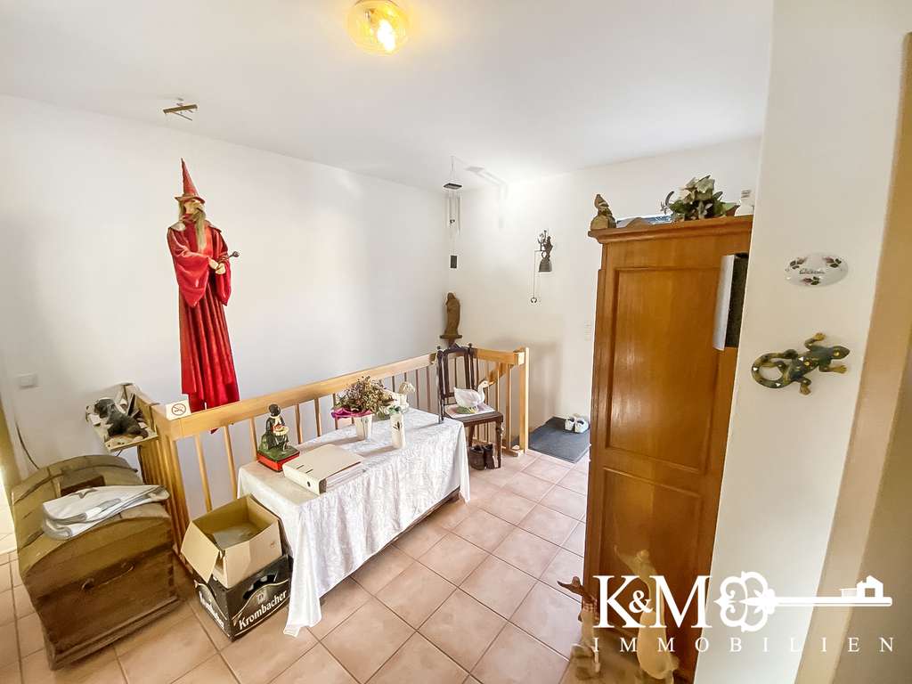 Immobilie in Langenfeld (Rheinland) - Wohnen im Grünen: Einfamilienhaus mit Terrasse, Balkon und großem Grundstück - Bild 4