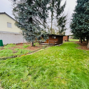 **Grundstücks-Juwel im Ortskern von Kirchhherten mit 2,5 geschossiger Bauweise und grossem Ga