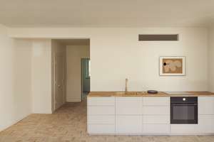 Scandi-Style Loft-Wohnung mit Parkett, schicker Einbauküche und Südwest-Balkon