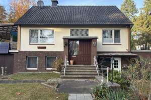 Attraktives Zuhause mit Mehrwert, Einfamilienhaus mit Einliegerwohnung in naturnaher Lage – Die vollständige Adresse der Immobilie erhältst du vom Anbieter., 31595 Steyerberg – Vorschaubild 3