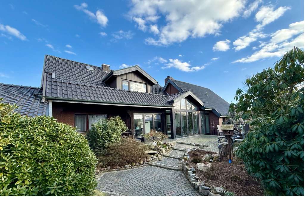 Immobilie in Drebber - Großzügiges Einfamilienhaus mit modernem, offenen Wohnkonzept und hochwertigem Garten - Bild 1