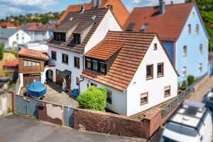 5,7 % Netto-Rendite für Kapitalanleger - Wohn-/Geschäftshaus in Würzburg-Versbach