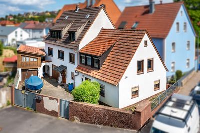 5,48 % Netto-Rendite für Kapitalanleger - Wohn-/Geschäftshaus in Würzburg-Versbach