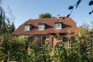 Einfamilienhaus mit Einliegerwohnung 
in idyllischer Lage – Die vollständige Adresse der Immobilie erhältst du vom Anbieter., 28879 Grasberg – Vorschaubild 1