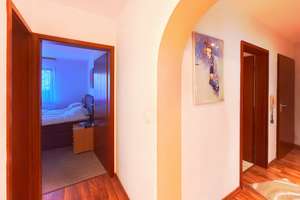 Kapitalanlage mit Perspektive: EG-Wohnung mit Südterrasse und TG-Stellplatz