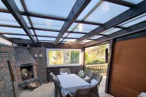 Sonnige 3-Zimmer-Wohnung mit großzügigem Wintergarten und Garten