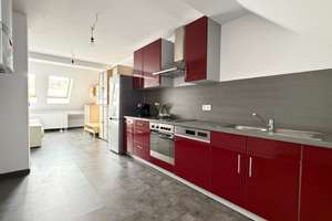 Moderne 2-Zimmer-Wohnung mit Einbauküche  Spitzboden