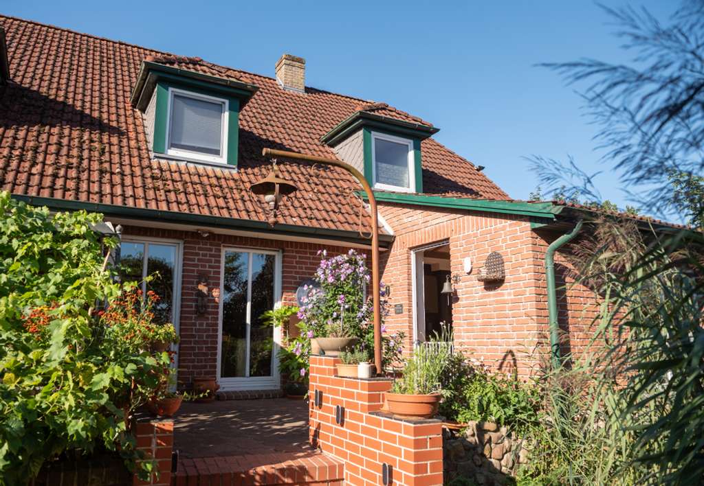 Immobilie in Grasberg - Einfamilienhaus mit Einliegerwohnung 
in idyllischer Lage - Bild 3