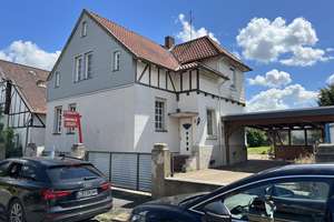 179.000€ - Keine Provision - Einfamilienhaus mit Anbau und großem Carport ruhig gelegen in Ilsede – Zum Hallenbad 8, 31241 Ilsede – Vorschaubild 1