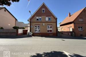 Attraktives Dreifamilienhaus mit kleiner Gewerbeeinheit in zentraler Lage von Dietzenbach