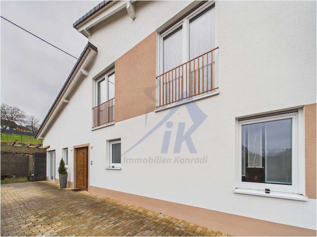 Immobilie in Schönenberg-Kübelberg - IK | Schönenberg: Modernes Zweifamilienhaus mit großzügigem Raumgefühl & 2 Einheiten - Bild 4