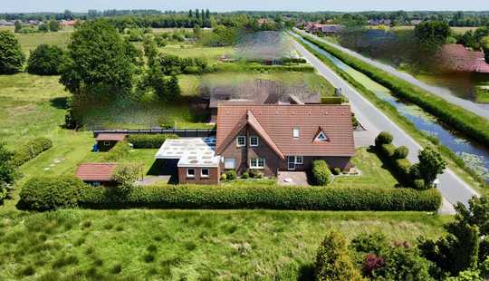 Bild von Großzügiges Einfamilienhaus auf traumhaftem Grundstück in Wiesmoor – direkt am Kanal!