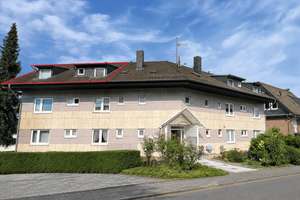 Helle Dachgeschosswohnung mit Balkon in zentraler Lage von Much