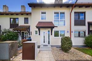 Vermietetes Reihenmittelhaus mit Einzelgarage in Kirchheim b. München