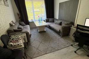 3-Zimmer-Wohnung mit großzügigem Privatgarten und Terrasse